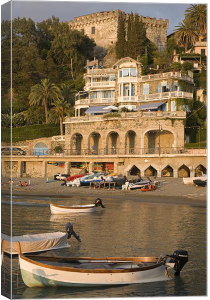 Boats moored at Levanto Beach. Canvas Print by Ian Middleton