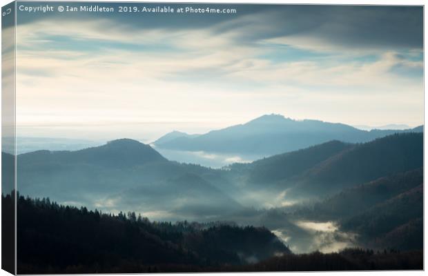 Morning view across to Sv Jost from the Jamnik Hil Canvas Print by Ian Middleton