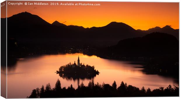 Lake Bled from Ojstrica at sunrise Canvas Print by Ian Middleton