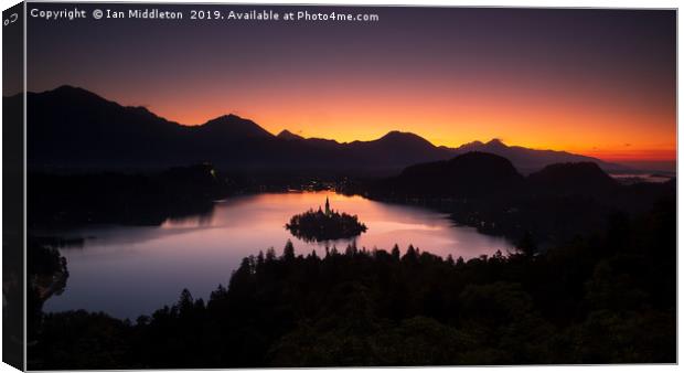 View of Lake Bled at sunrise from Ojstrica Canvas Print by Ian Middleton