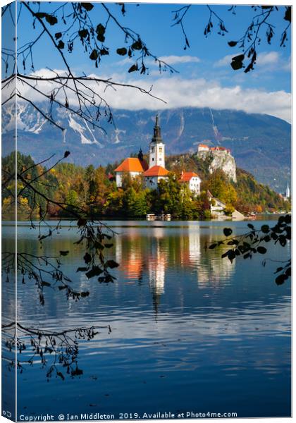 Autumn colours at Lake Bled Canvas Print by Ian Middleton