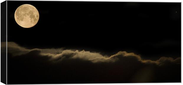 Full moon setting over clouds Canvas Print by Ian Middleton