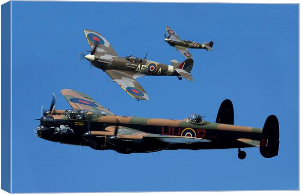 Lancaster Bomber and Spitfires Canvas Print by Oxon Images