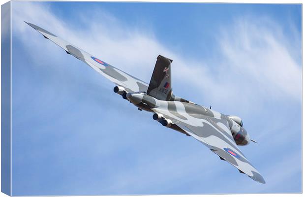  Vulcan and wispy clouds at Duxford Canvas Print by Oxon Images