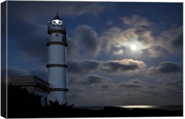 Lighthouse at night Canvas Print by Chris Owen