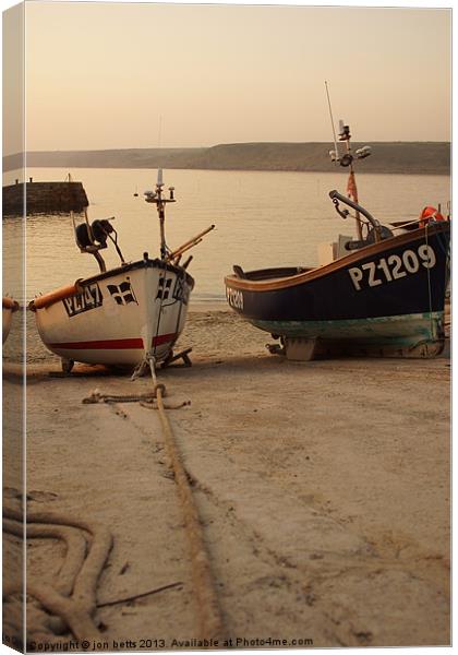 fishing boats in harbour Canvas Print by jon betts