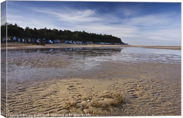 Beach huts and blue sky, Wells-next-the-sea Canvas Print by Liam Grant