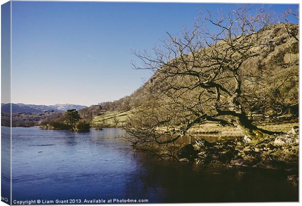 Partly frozen lake. Rydal Water, Lake District, Cu Canvas Print by Liam Grant