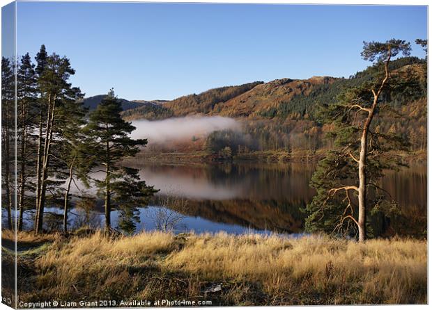 Low mist and reflections. Thirlmere Reservoir. Canvas Print by Liam Grant