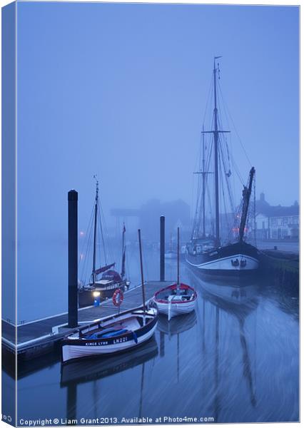 Fog over harbour at dawn, Wells-next-the-sea. Canvas Print by Liam Grant