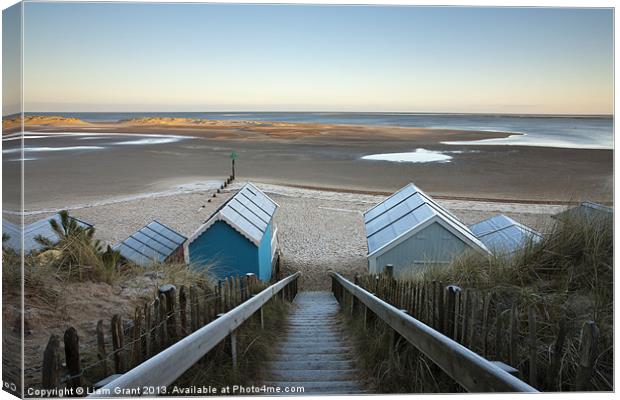 Frost covered beach huts, Wells-next-the-sea Canvas Print by Liam Grant