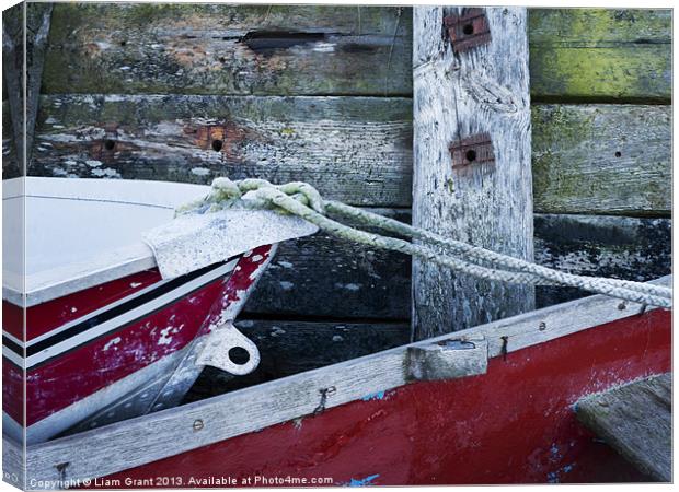 Detail of boats and seawall. Burnham Overy Staithe Canvas Print by Liam Grant
