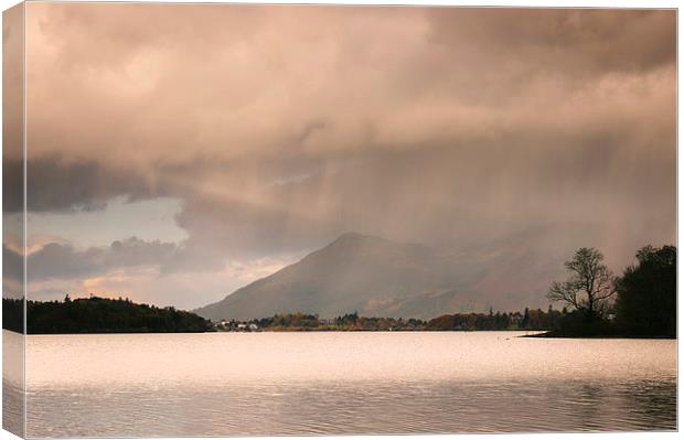 Evening rainclouds and distant rain over Skiddaw a Canvas Print by Liam Grant