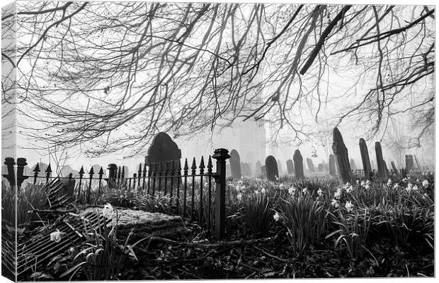 Rural church and graveyard in early morning fog. Canvas Print by Liam Grant