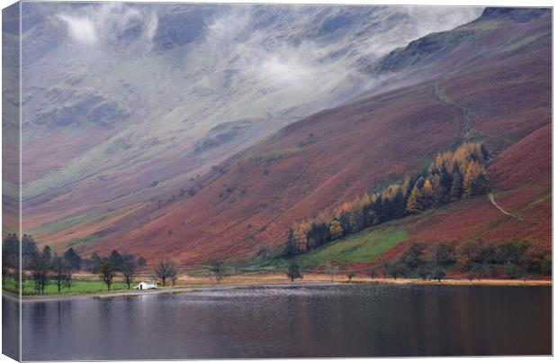 Cloud and autumnal colours. Buttermere, Cumbria, U Canvas Print by Liam Grant