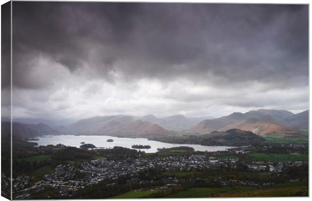 Rain clouds over Derwent Water and Keswick. Cumbri Canvas Print by Liam Grant