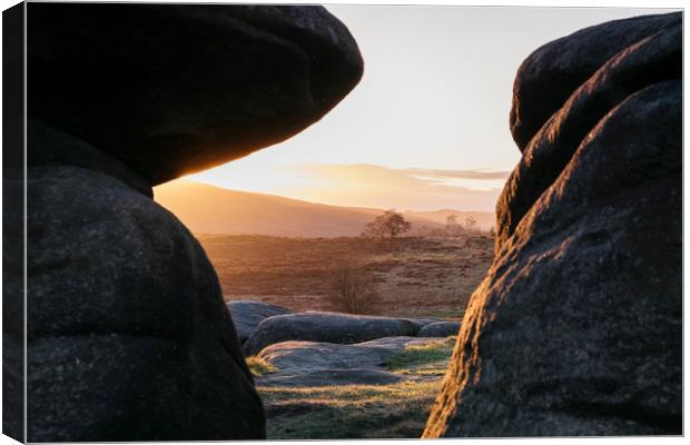 Owler Tor rock formations at sunset. Derbyshire, U Canvas Print by Liam Grant