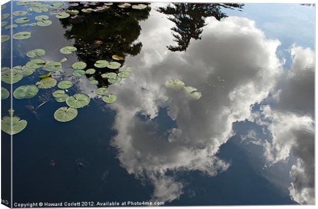 Reflected clouds Canvas Print by Howard Corlett