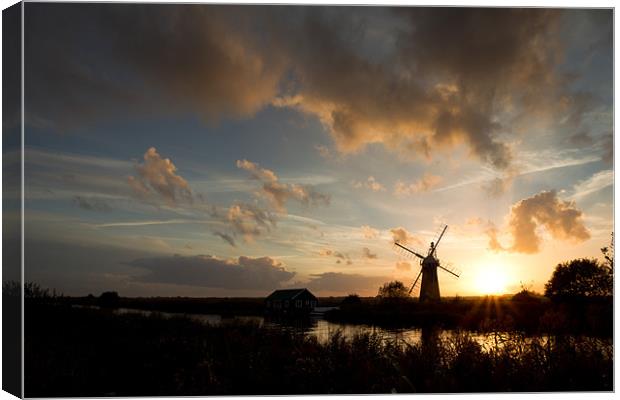 Thurne Windmill at sunset Canvas Print by Simon Wrigglesworth