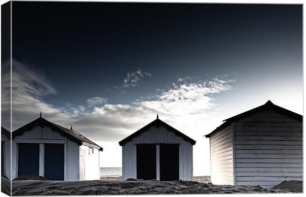 Southwold beach huts in winter Canvas Print by Simon Wrigglesworth