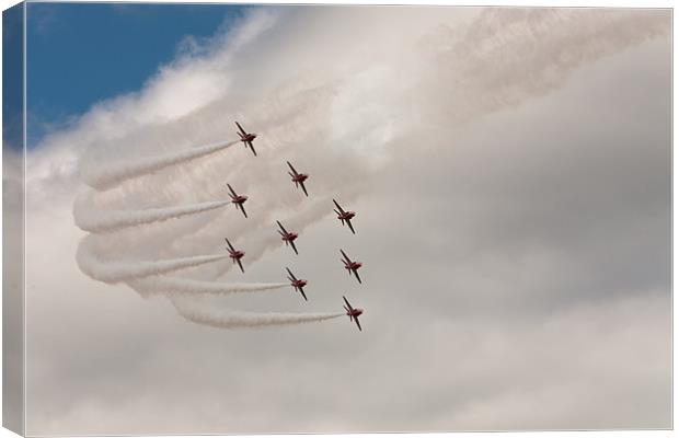 Red arrows Canvas Print by Simon Wrigglesworth