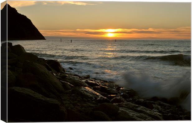 Surf and Sunset at lynmouth  Canvas Print by graham young