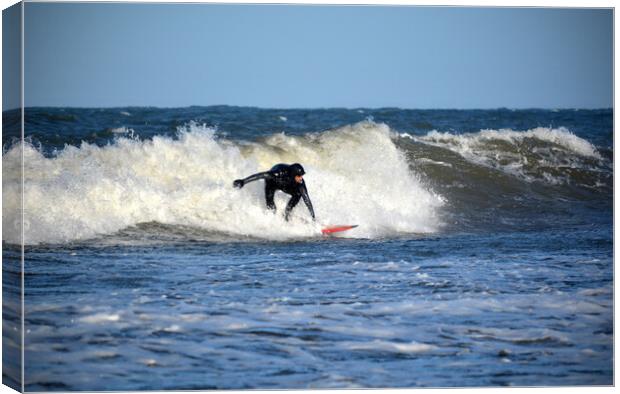 Surfing at Lynmouth Canvas Print by graham young