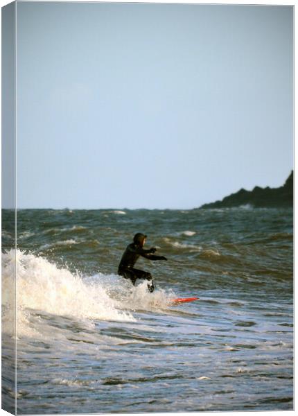 Surfing at Lynmouth Canvas Print by graham young