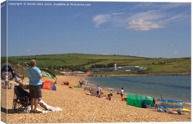 A Day On The Beach Canvas Print by Nicola Clark