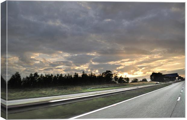 Road and the sunset Canvas Print by Vishal Arvinda