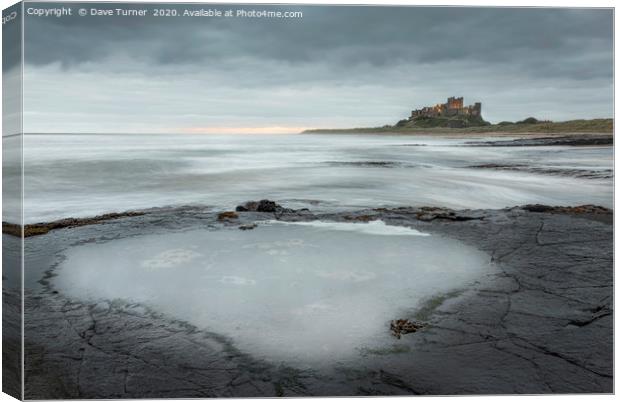 Bamburgh Castle, Northumberland Canvas Print by Dave Turner