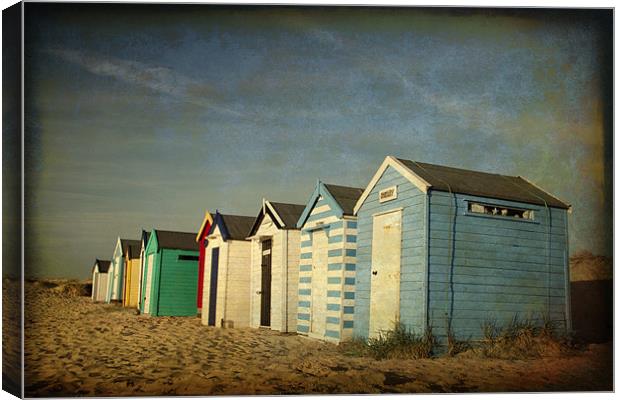 Beach Huts at Southwold, Suffolk Canvas Print by Dave Turner