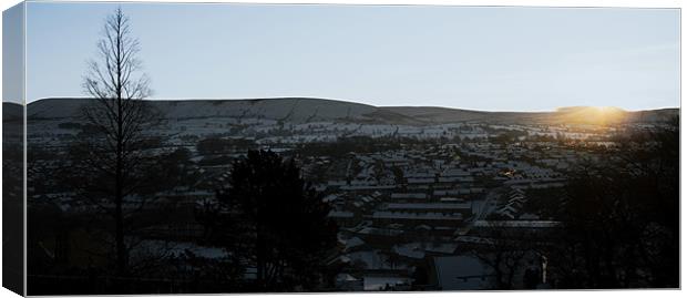 Sunrise over a wintery Pendle Canvas Print by Peter Elliott 