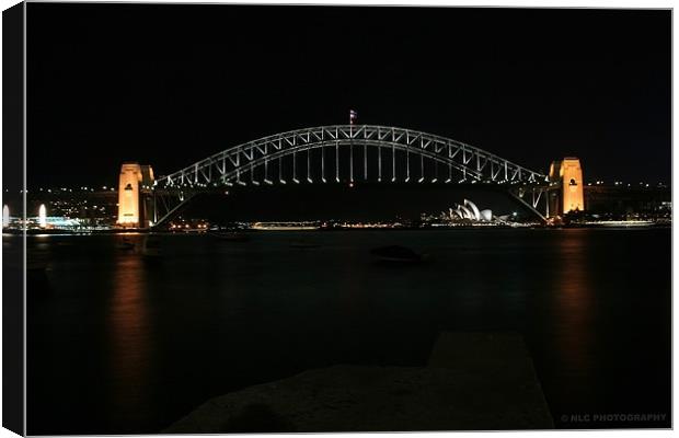 Sydney Bridge by night Canvas Print by Nigel Coomber