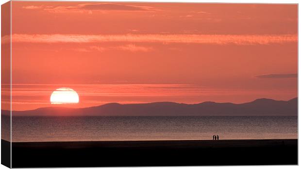 Sunset on Barmouth beach Canvas Print by Tony Bates