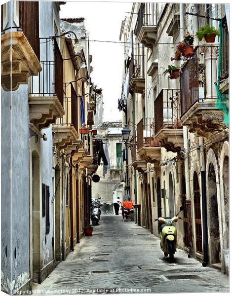 moped alley, Sicily Canvas Print by Lucy Antony