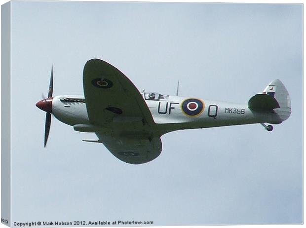 Spitfire in Flight Canvas Print by Mark Hobson