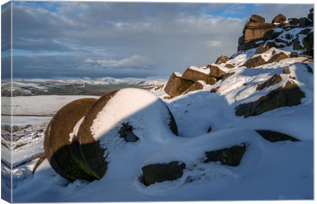 Stanage Edge Snowy Millstones Canvas Print by James Grant