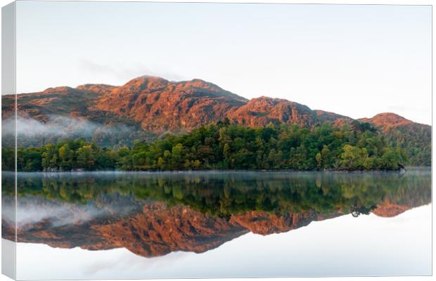 Serene Highland Reflection Canvas Print by Stuart Jack