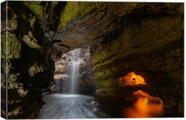 Enchanted Waterfall in Smoo Cave Canvas Print by Stuart Jack