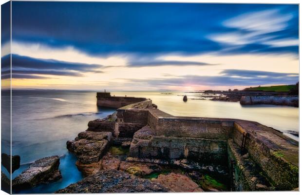 St Monan, Fife - breakwater at sunset Canvas Print by Stuart Jack