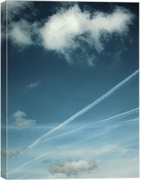 fluffy white clouds and vapour trails Canvas Print by Heather Newton