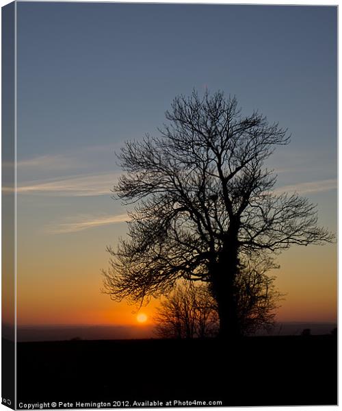 Hill top tree silhouetted against the sunset Canvas Print by Pete Hemington
