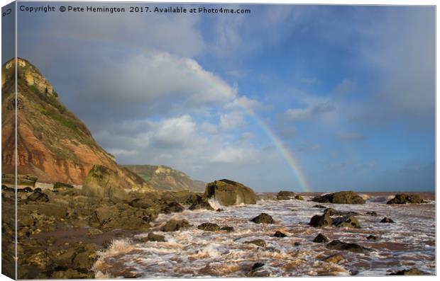 Rainbow over Dunscombe Cliff Canvas Print by Pete Hemington