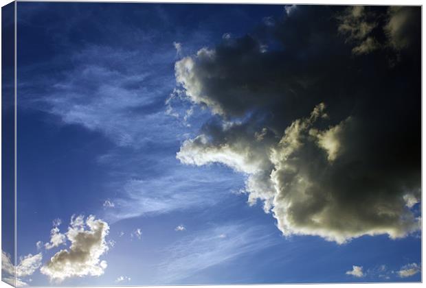 May Clouds Canvas Print by Darren Burroughs