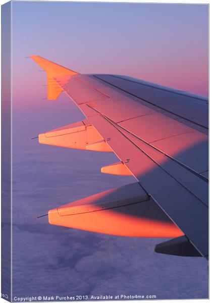 Warm Glow of Sun Rise on Airplane Wing Canvas Print by Mark Purches