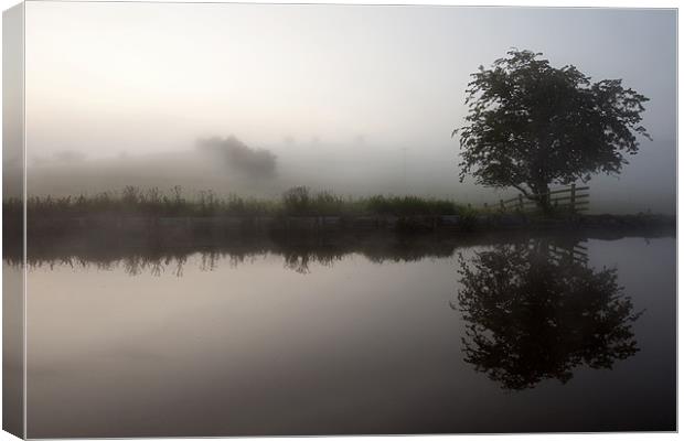 Mist On The Leeds & Liverpool Canal Canvas Print by Steve Glover