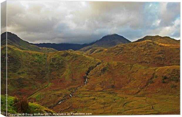Snowdon with cloud cover Canvas Print by Doug McRae