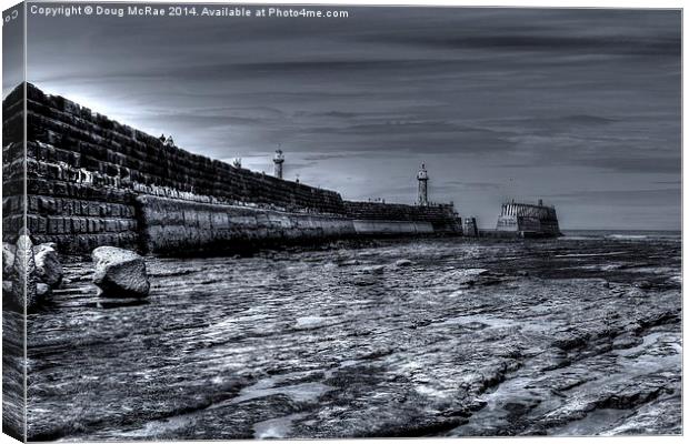  Harbour wall whitby bay Canvas Print by Doug McRae