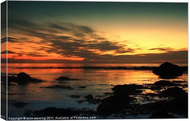 Dusk by the sea Canvas Print by Sean Wareing